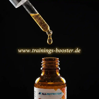 Goldene Tropfen aus Pipette in braune Flasche – Nahrungsergänzungsmittel für Sport und Training