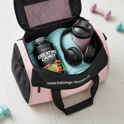 Fitness-Tasche mit Creatine Candy, Shaker, Kopfhörern und Handtuch – ideal fürs Training
