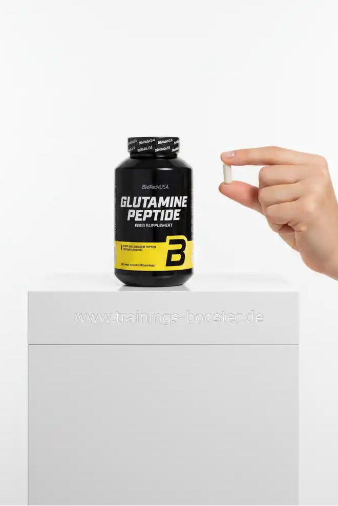 Glutamin Peptide Nahrungsergänzungsmittel in schwarzer Dose mit gelbem Etikett und Tablette in der Hand