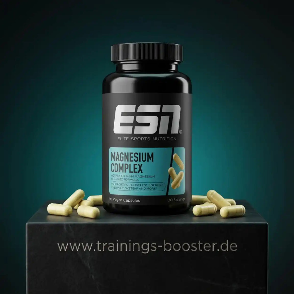 ESN Magnesium Complex 4-in-1 Nahrungsergänzungsmittel Dose mit Kapseln auf dunklem Podest